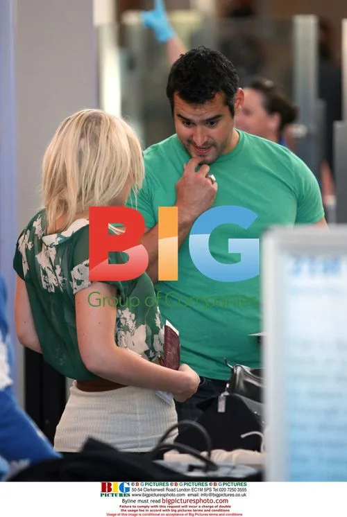 Newlyweds Natasha Bedingfield and Matthew Robinson at LAX