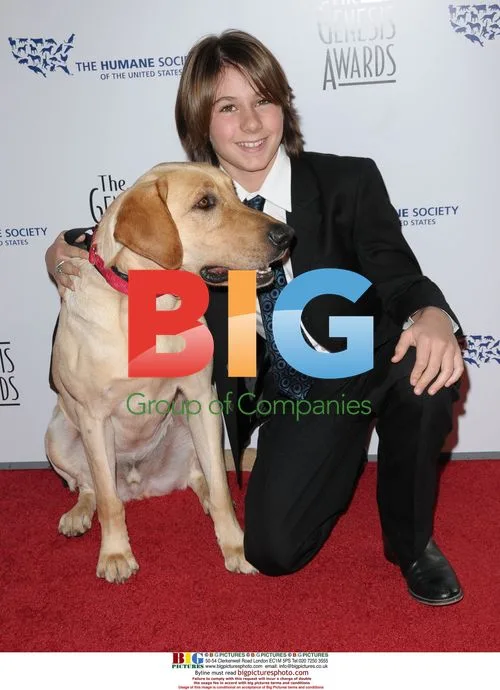Dominic Scott Kay and dog Marley at Genesis Awards