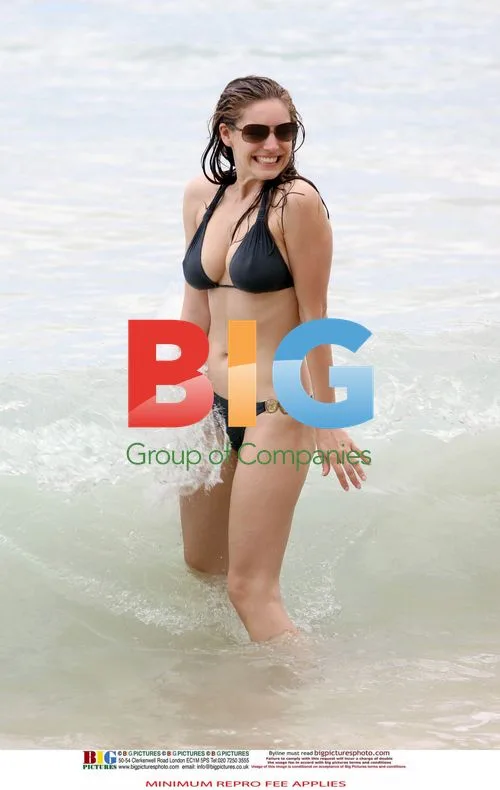 Kelly Brook in Black Bikini in Caribbean