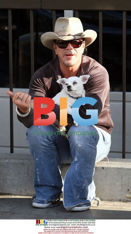 Mickey Rourke with Chihuahua at LAX