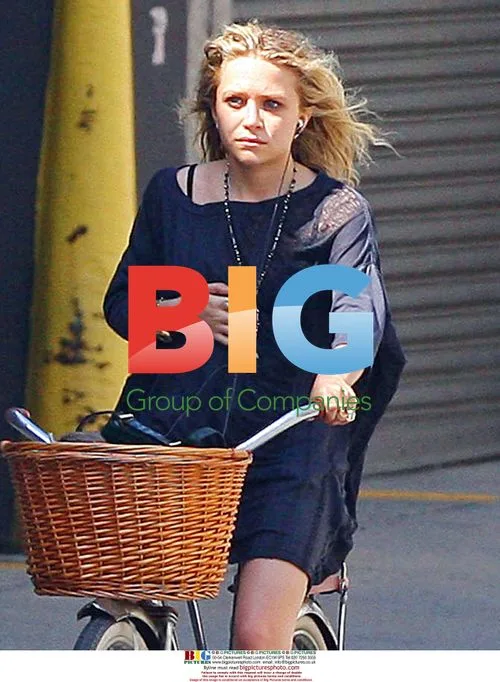 Mary-Kate Olsen rides bike with boyfriend