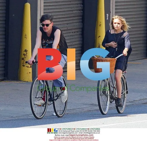 Mary-Kate Olsen rides bike with boyfriend