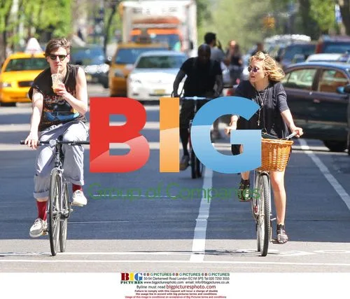 Mary-Kate Olsen rides bike with boyfriend