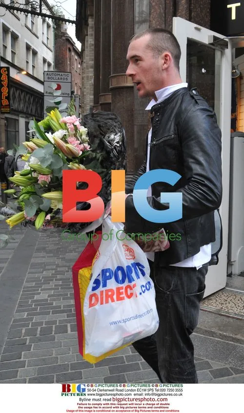 Hollyoaks actor Barry Sloane buys flowers in Liverpool