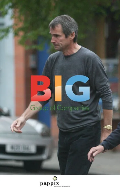 Alan Hansen looks somber in London