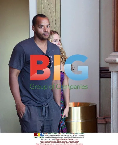 Donald Faison and girlfriend at The Grove
