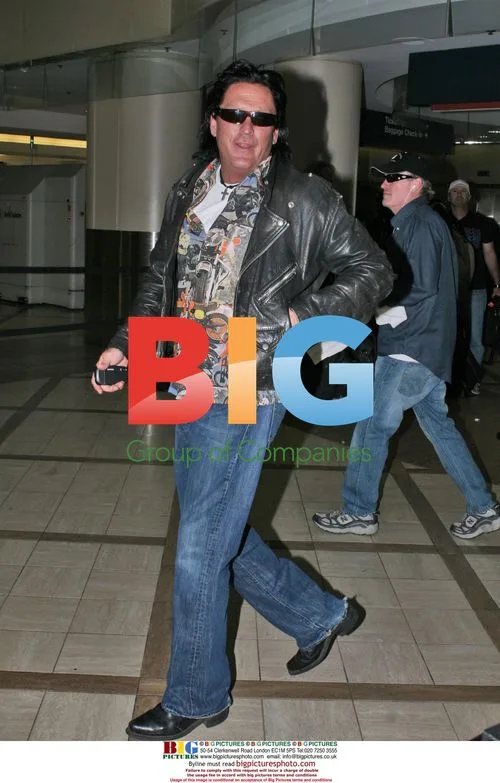 Michael Madsen departs LAX in casual look