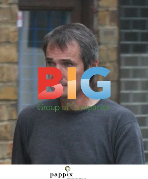 Alan Hansen Appears Somber in North London