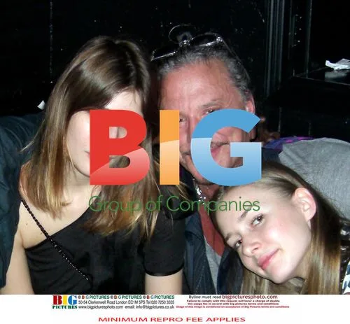 Mickey Rourke and Eugenia Kissing
