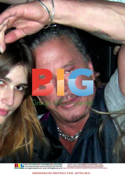 Mickey Rourke kisses Serbian model Eugenia