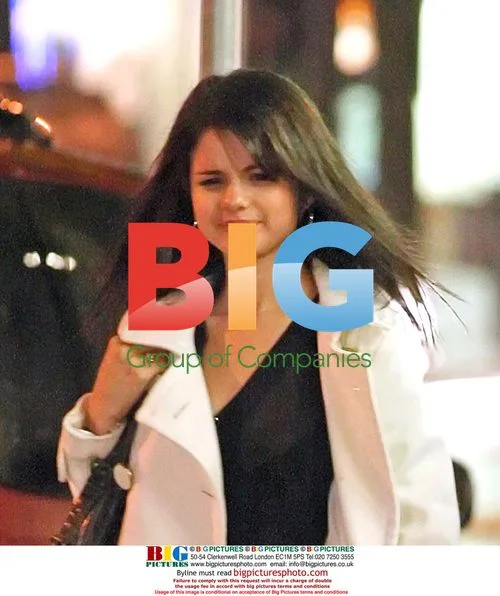 Taylor Lautner and Selena Gomez leave restaurant