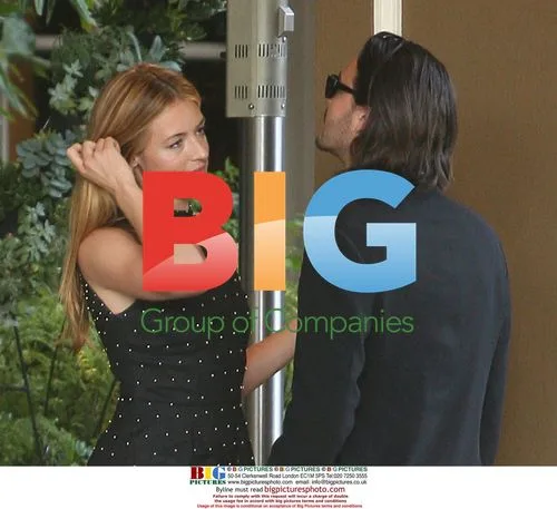 Cat Deeley and Jack Huston Flirt Outside Hotel