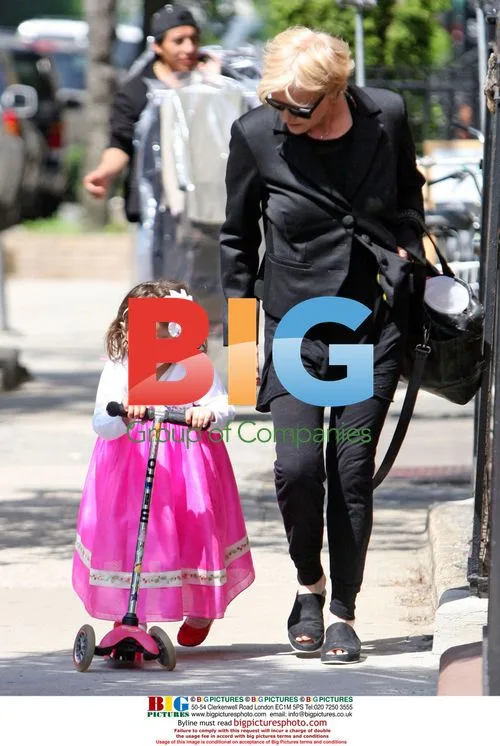 Hugh Jackman Jogs with Daughter