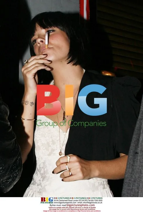 Lily Allen and Jaime Winston smoke outside Groucho