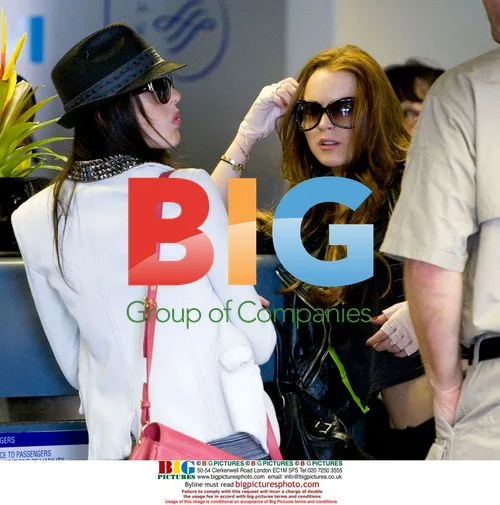 Lindsay Lohan and sister Ali depart LAX