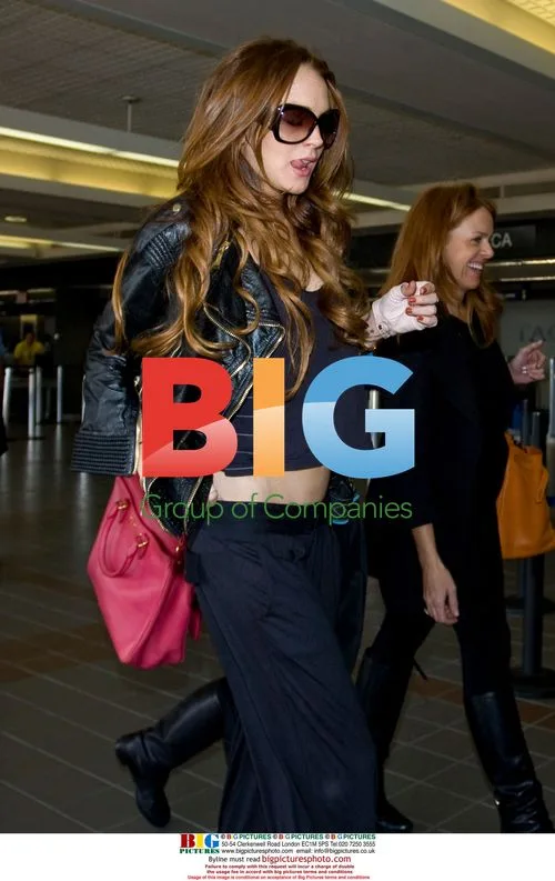 Lindsay Lohan Departing LAX