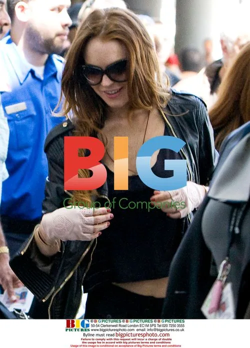 Lindsay Lohan departing LAX