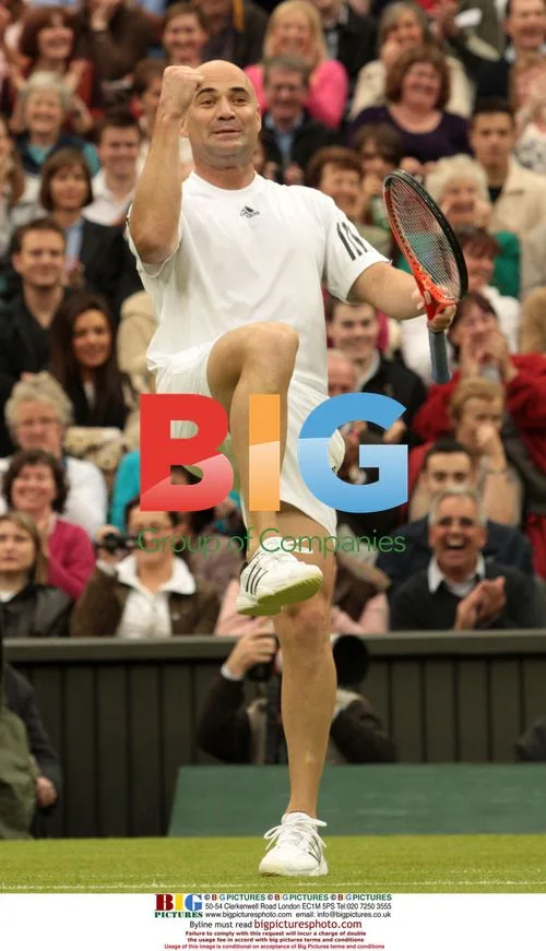 Agassi and Graf play mixed doubles at Wimbledon