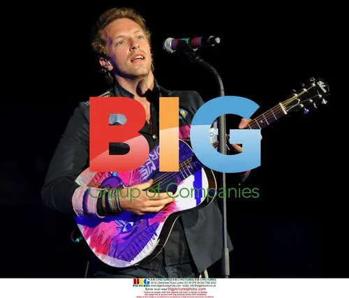 Chris Martin of Coldplay performs on tour