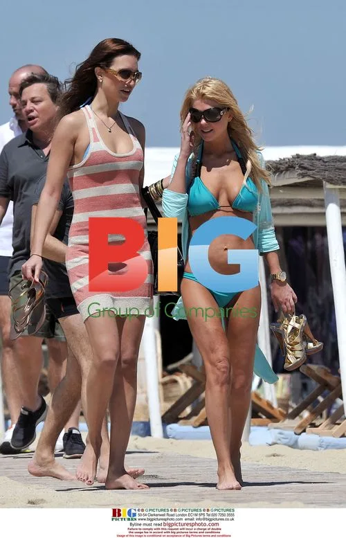 Flavio Briatore and Tara Reid at Club 55