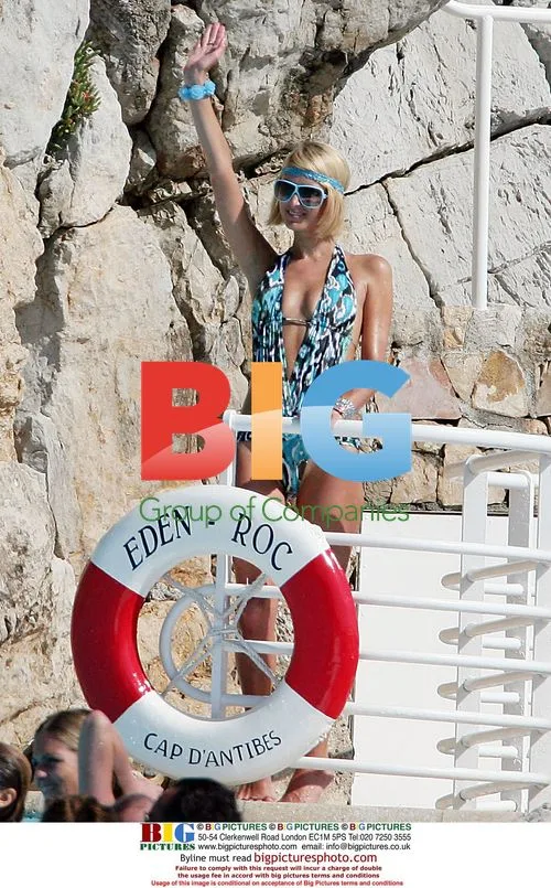 Paris Hilton with boyfriend in pool