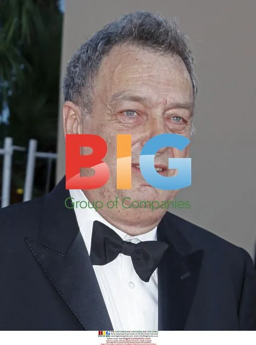 Director Stephen Frears arrives on red carpet at Cannes