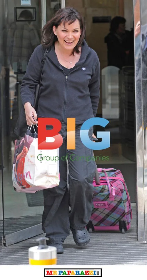 Lorraine Kelly Braves Windy Weather in Crocs
