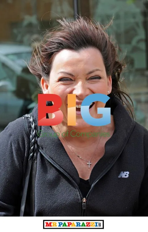 Lorraine Kelly Braves Windy Weather in Crocs