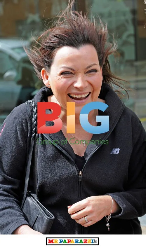 Lorraine Kelly braves windy weather