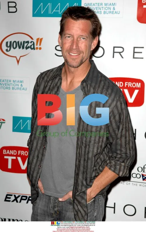 James Denton poses on red carpet in Miami