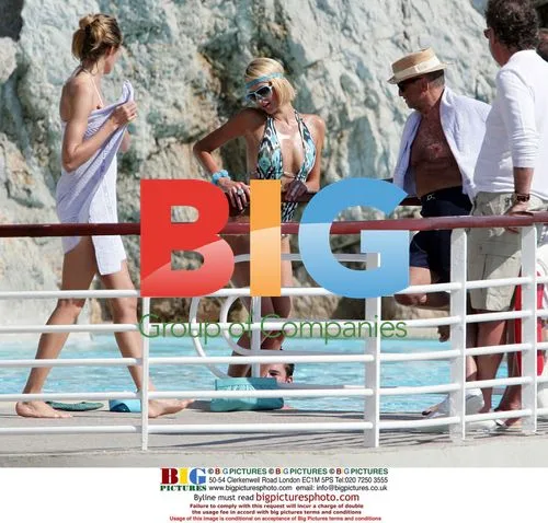Paris Hilton in pool with boyfriend