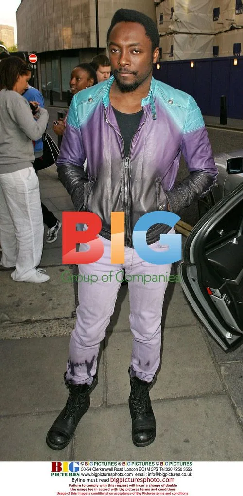 Will I am and Taboo leaving London hotel