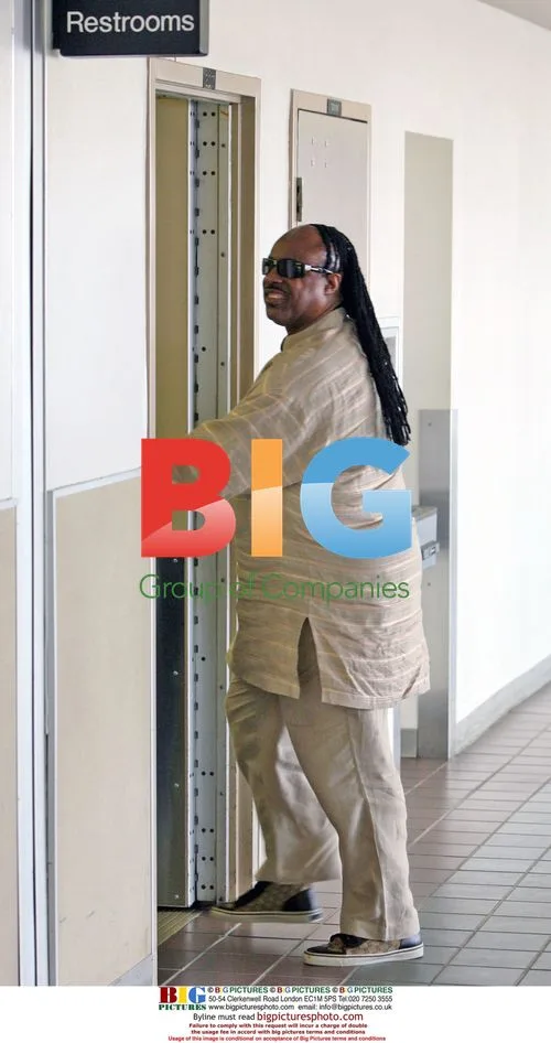 Stevie Wonder Departs LAX