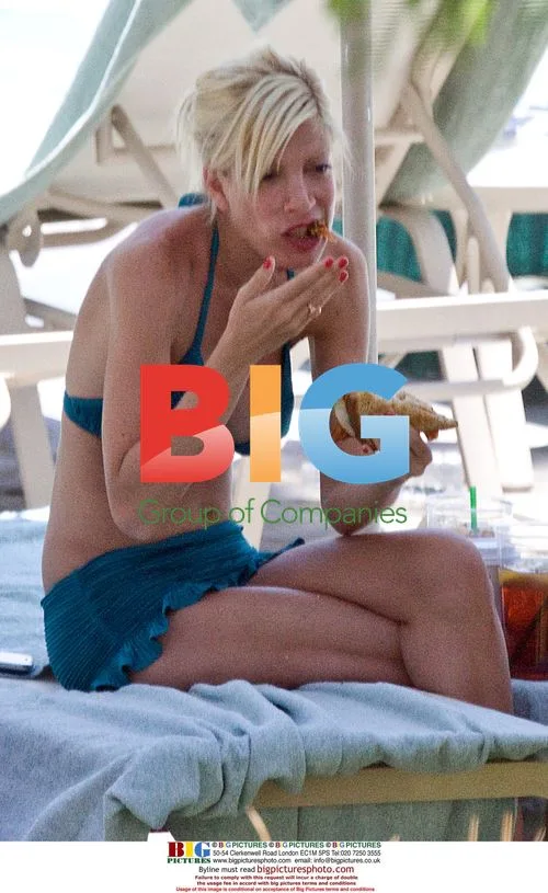 Tori Spelling and Family Relax Poolside