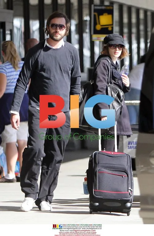 Winona Ryder at LAX with Mystery Man