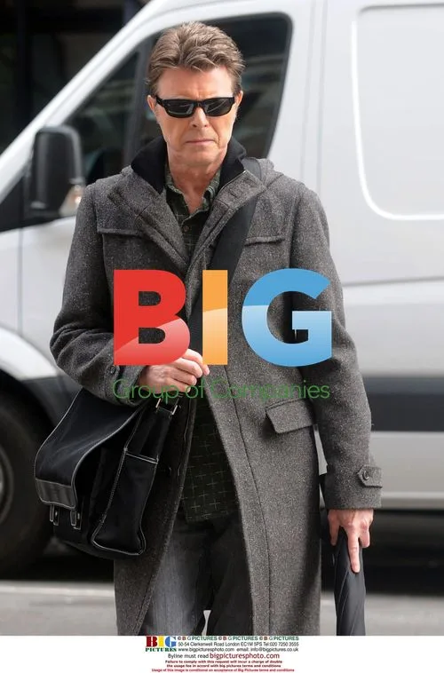 David Bowie with Umbrella in NYC