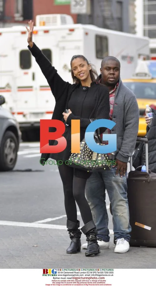 Model Noemie Lenoir hails cab in NYC