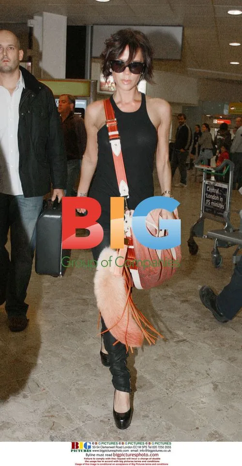 Victoria 'Posh' Beckham at London Heathrow
