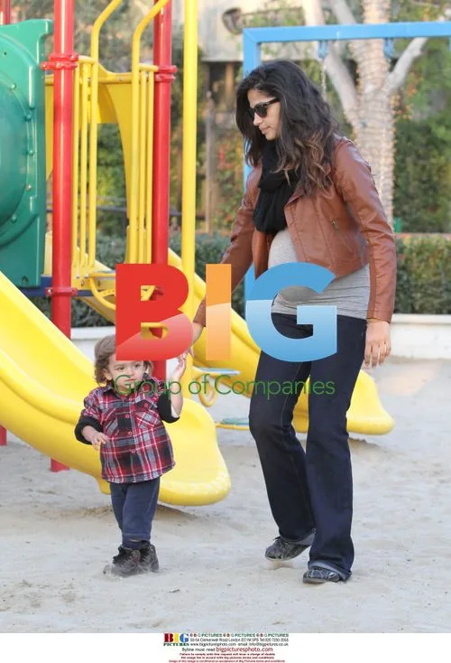 Pregnant Camila Alves and son Levi at park