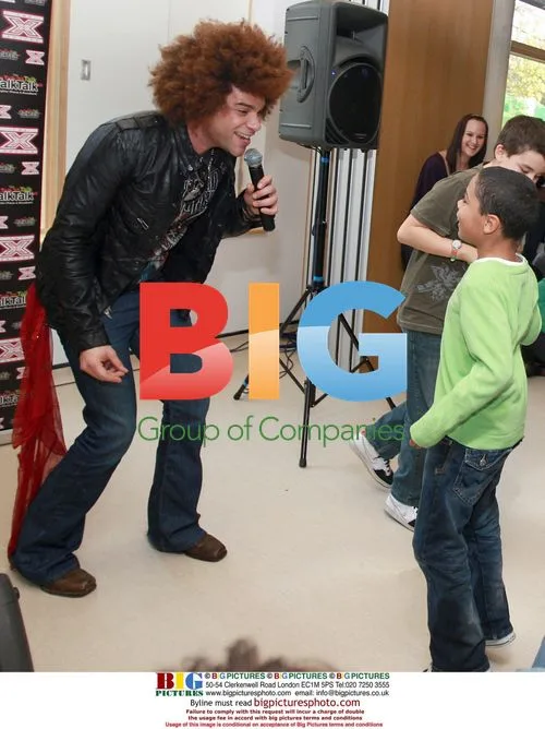 Jamie "Afro" Archer Performs for Children