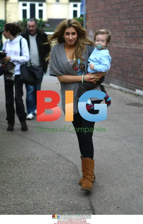 X Factor's Stacey Solomon visits son in Dagenham