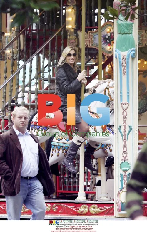 Penny Lancaster and son Alistair at Cannes funfair