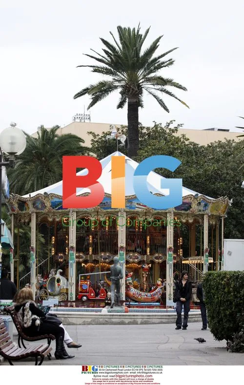 Penny Lancaster and son Alistair at Cannes funfair