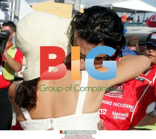 Ashley Judd hugs Dario Franchitti