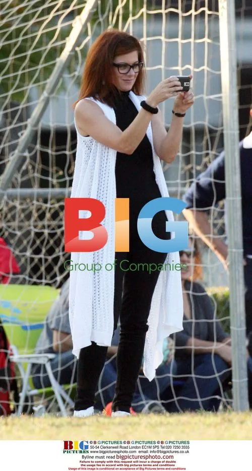 Debra Messing & husband at son's soccer match