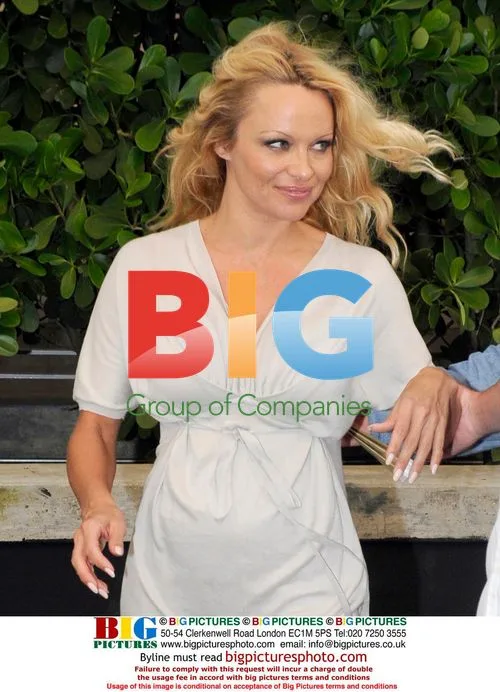 Pamela Anderson Leaving Miami Hotel