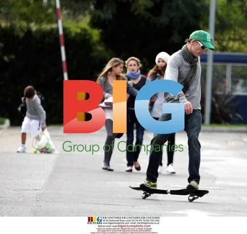 Prince Kyril skateboarding with children