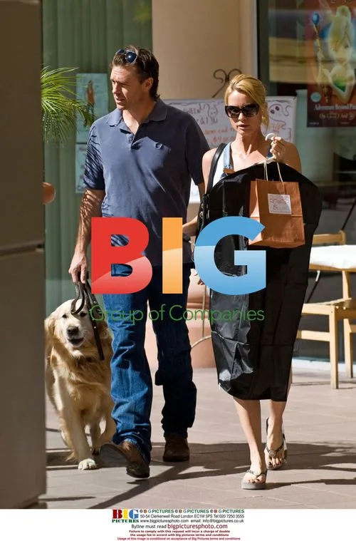 Nicollette Sheridan and boyfriend shop