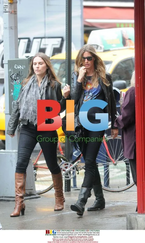 Gisele Bunchen Takes Walk in Rain