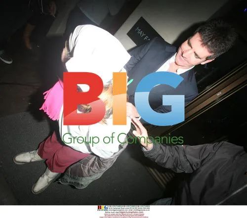 Simon Cowell Leaving Hotel After Birthday Party